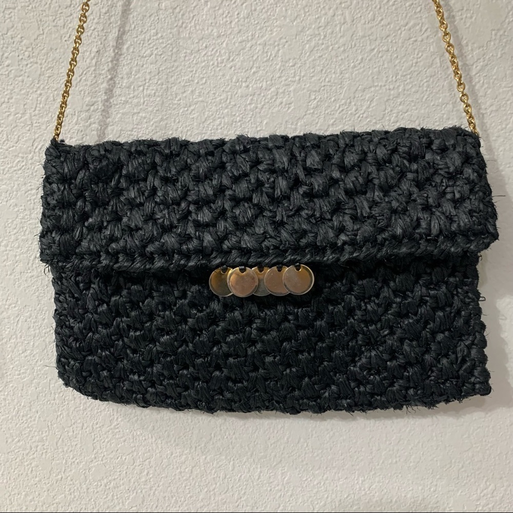Rodo cross body clutch beach